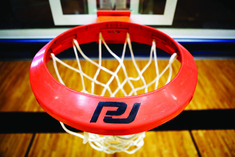 The Perimeter Pro 1 – Heavy-Duty, High-Impact Rubber Basketball Training Aid easily attaches to a 15” rim, featuring a cone-shaped target to improve precision shooting, arc control, muscle memory, and confidence for enhanced on-court performance.